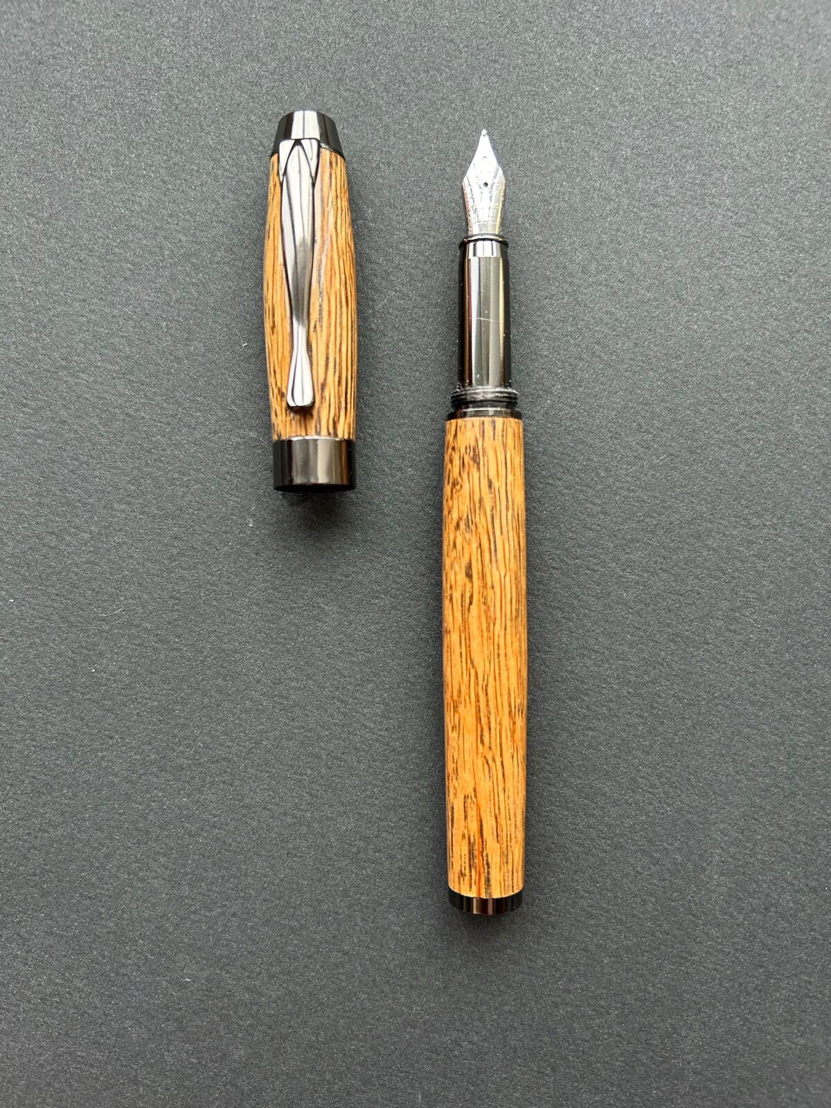 Artisan using lathe in woodworking workshop