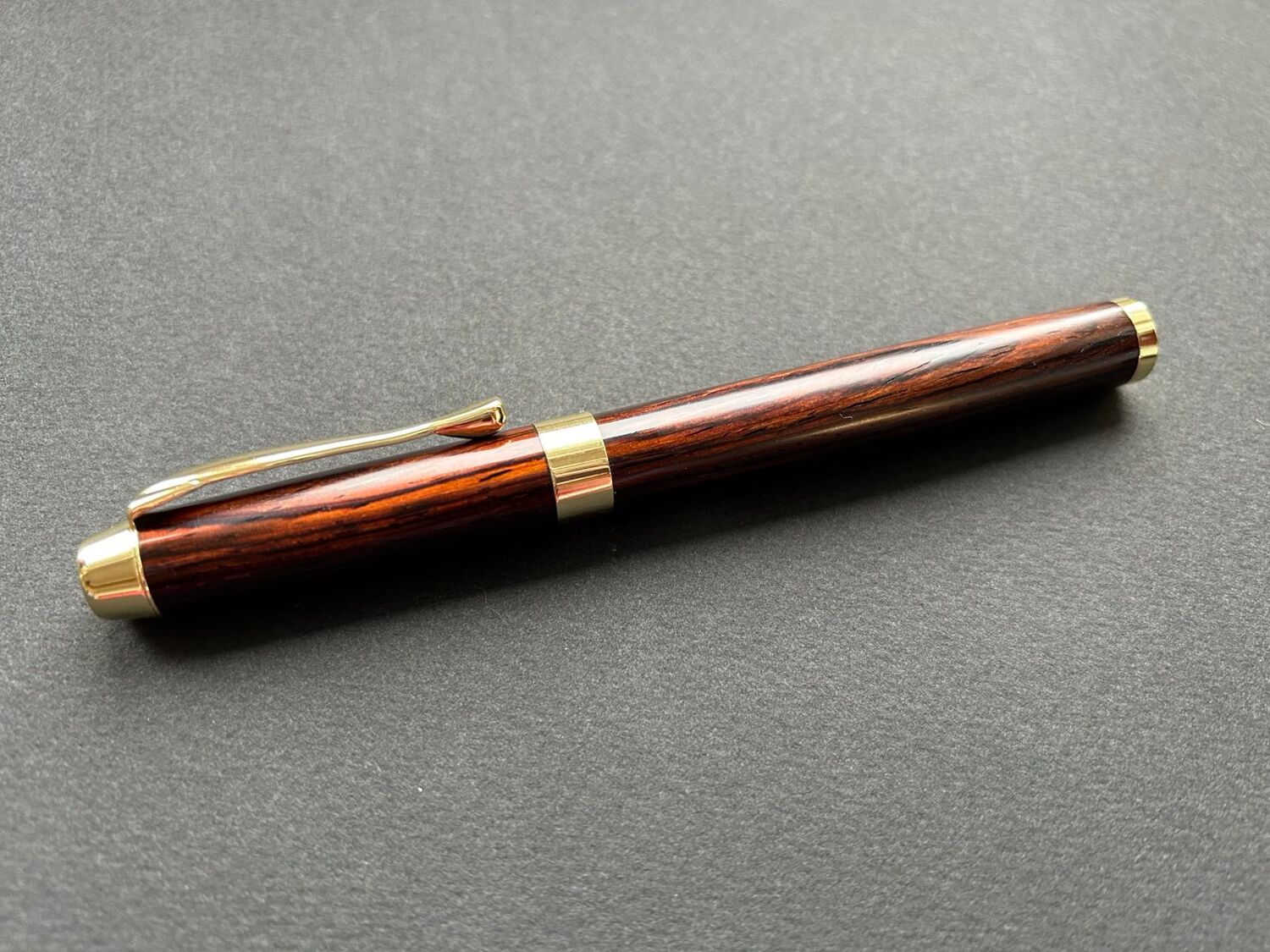 Artisan using lathe in woodworking workshop